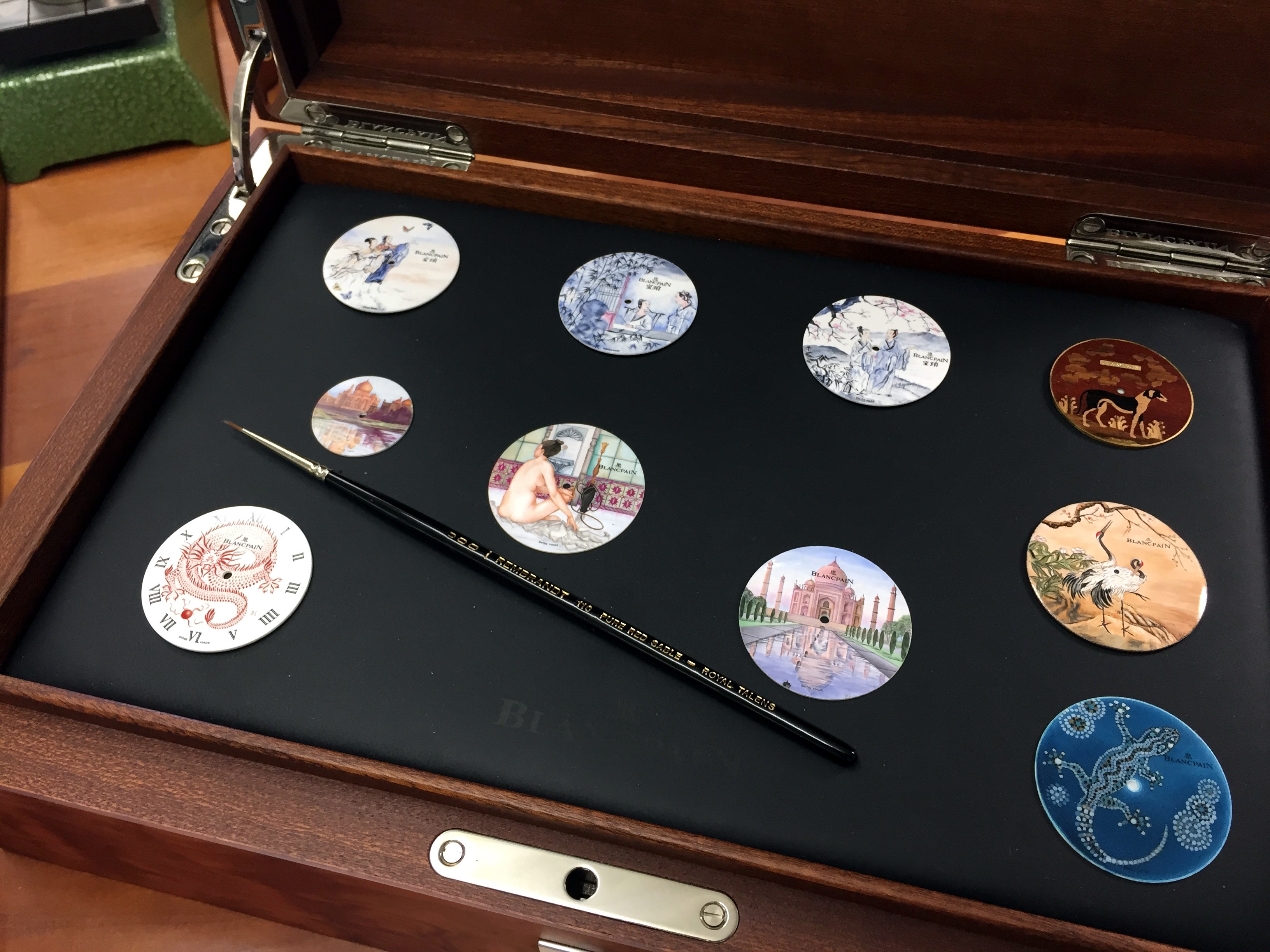 Blancpain enamel dials in a presentation box showcasing the miniature painting enamelling technique