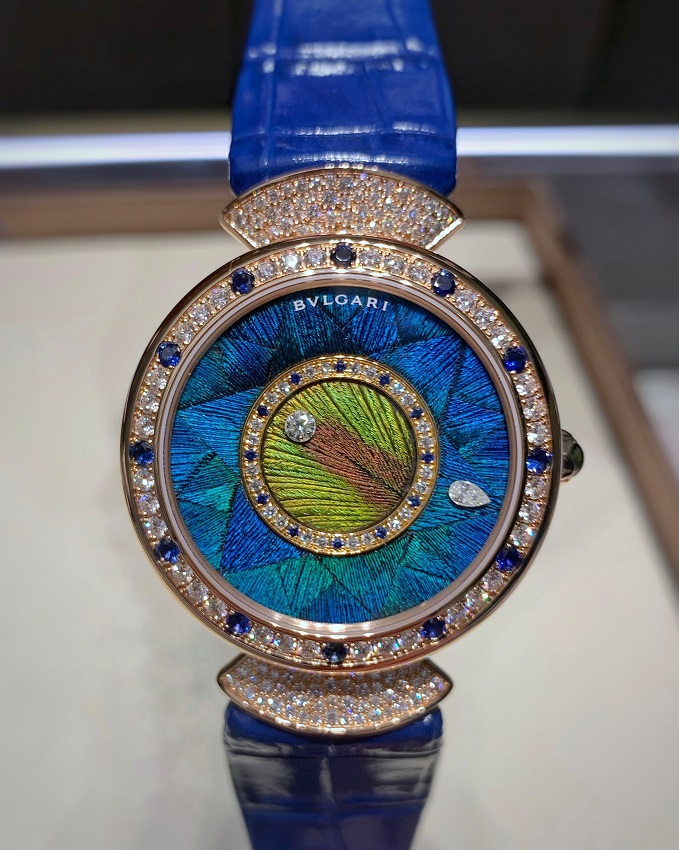 Bulgari Divas' Dream Peacock Dischi watch with feather marquetry dial and gem-set case