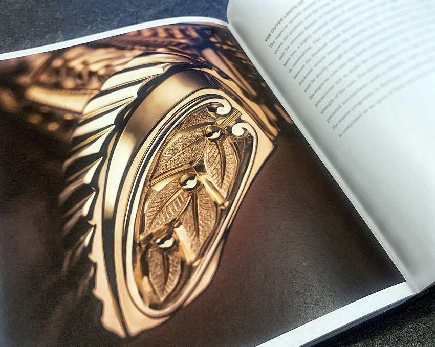 Grandmaster Chime book macro photograph of lug engraving